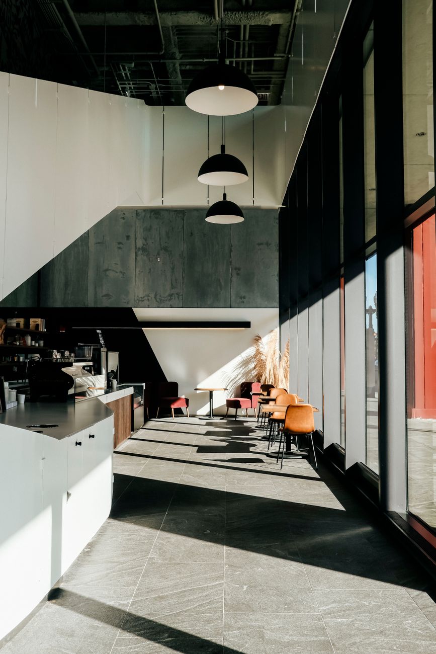 modern cafe interior with sunlit seating area