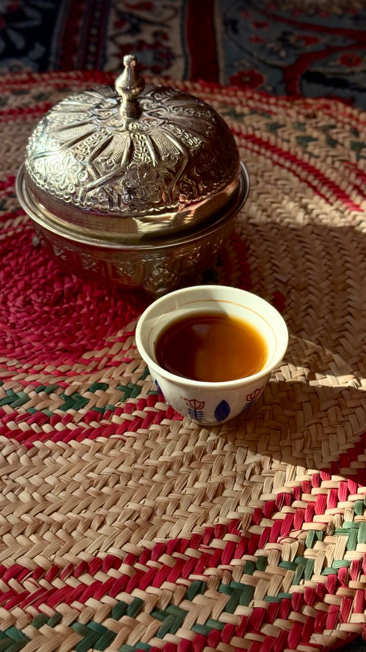traditional arabic coffee set on woven mat